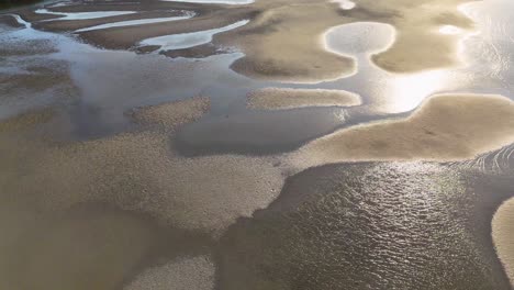 aerial view of tidal flats at low tide