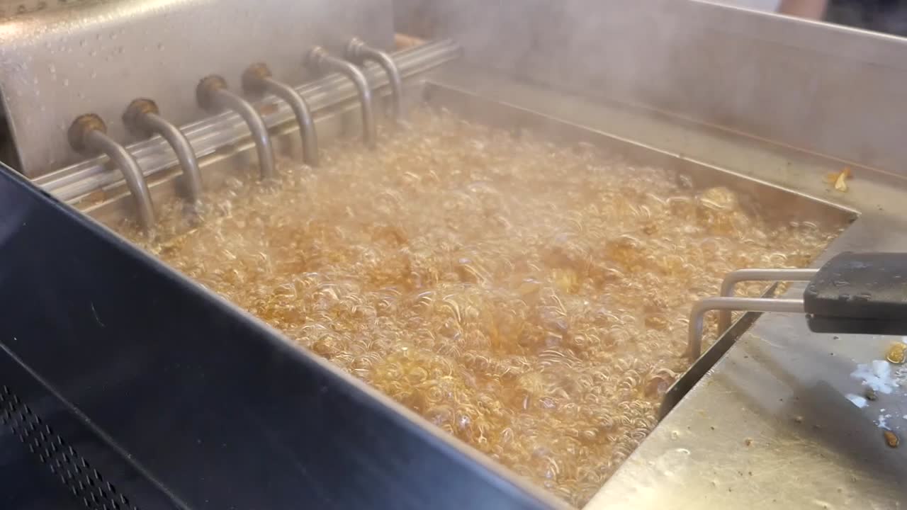 Deep fryer with bubbling hot oil