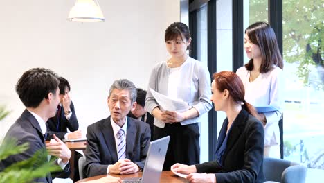 businesspersons having a meeting in an office