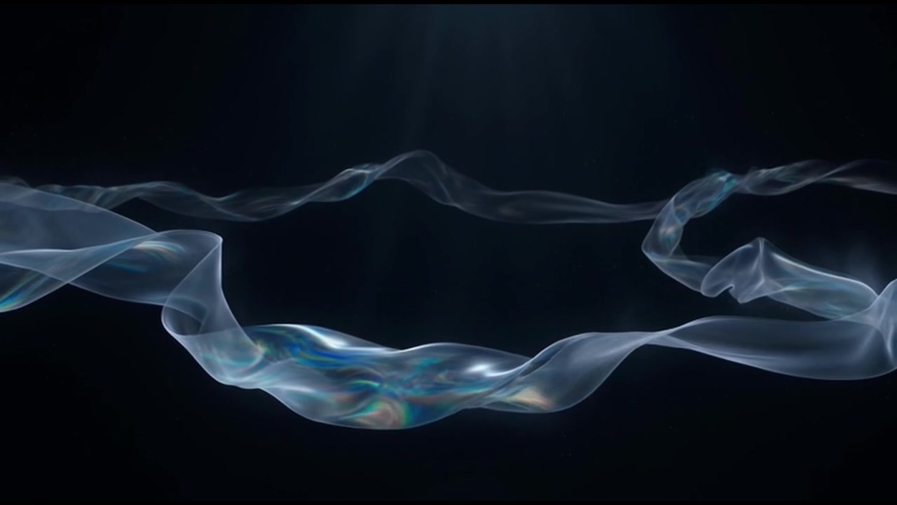 Abstract Flowing Iridescent Silk Fabric on Black Background