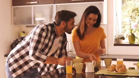 couple having breakfast in the kitchen