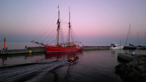 sailboat harbor drone with dingy drone - denmark