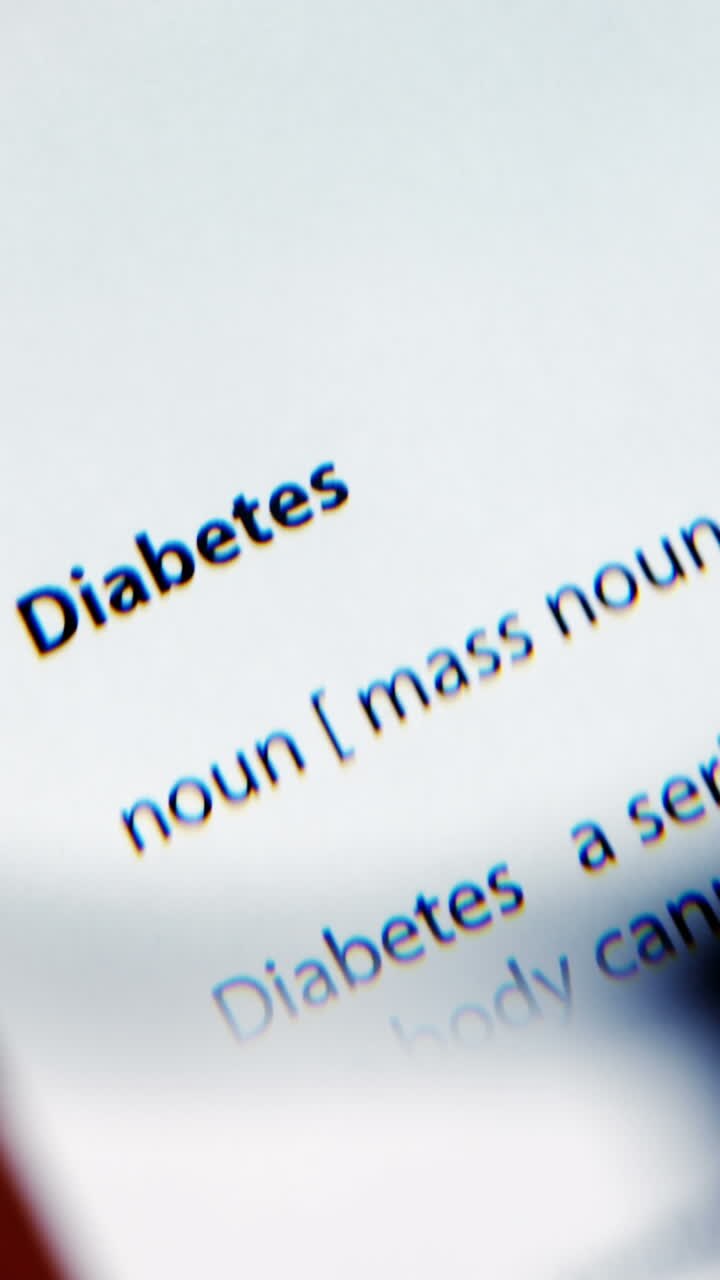 Magnifying glass highlighting diabetes