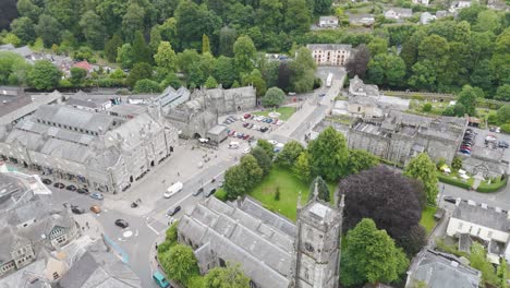 Drone-view-of-the-center-of-Tavistock,-highlighting-the-historic-architecture-and-layout-of-the-town,-Devon,-UK