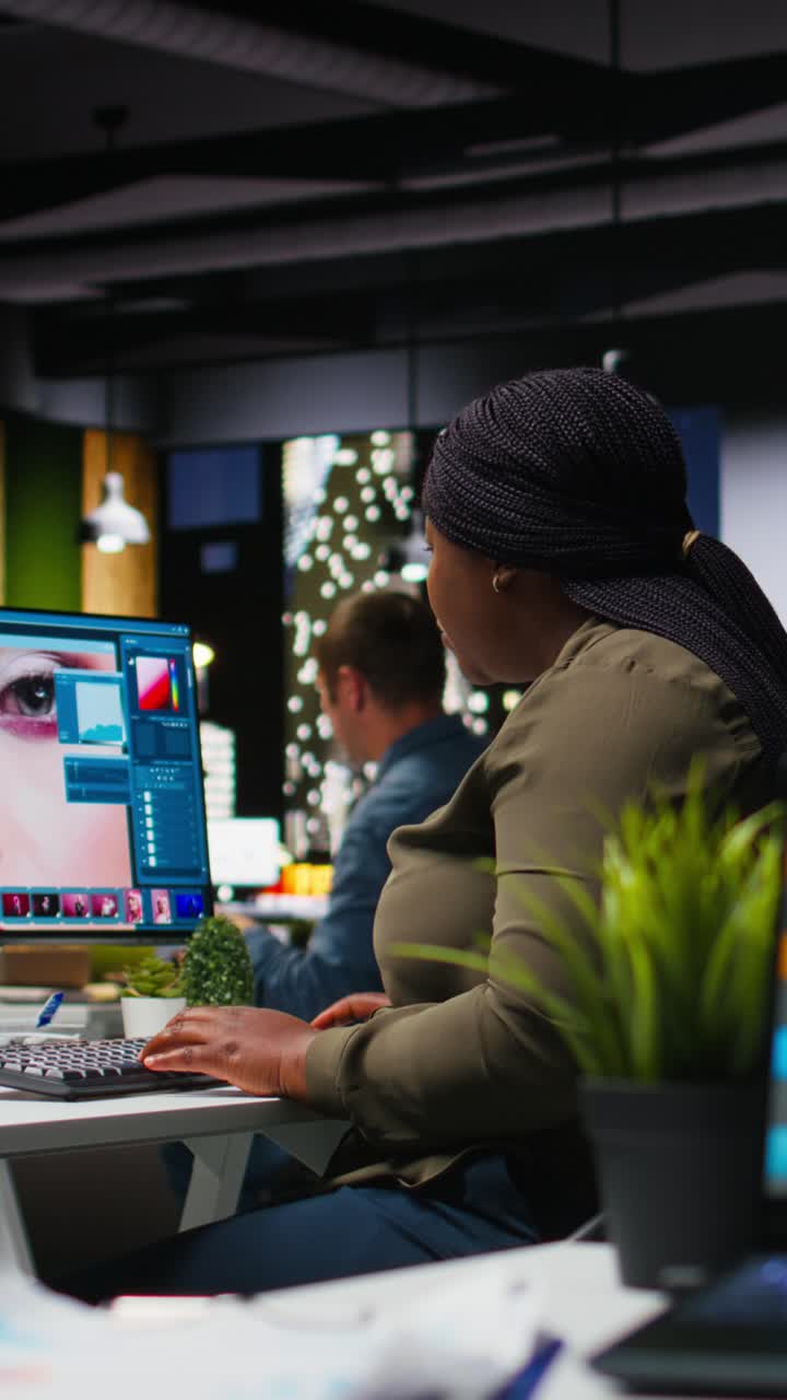 Vertical Video African american photo editor uses AI neural networks for retouching content