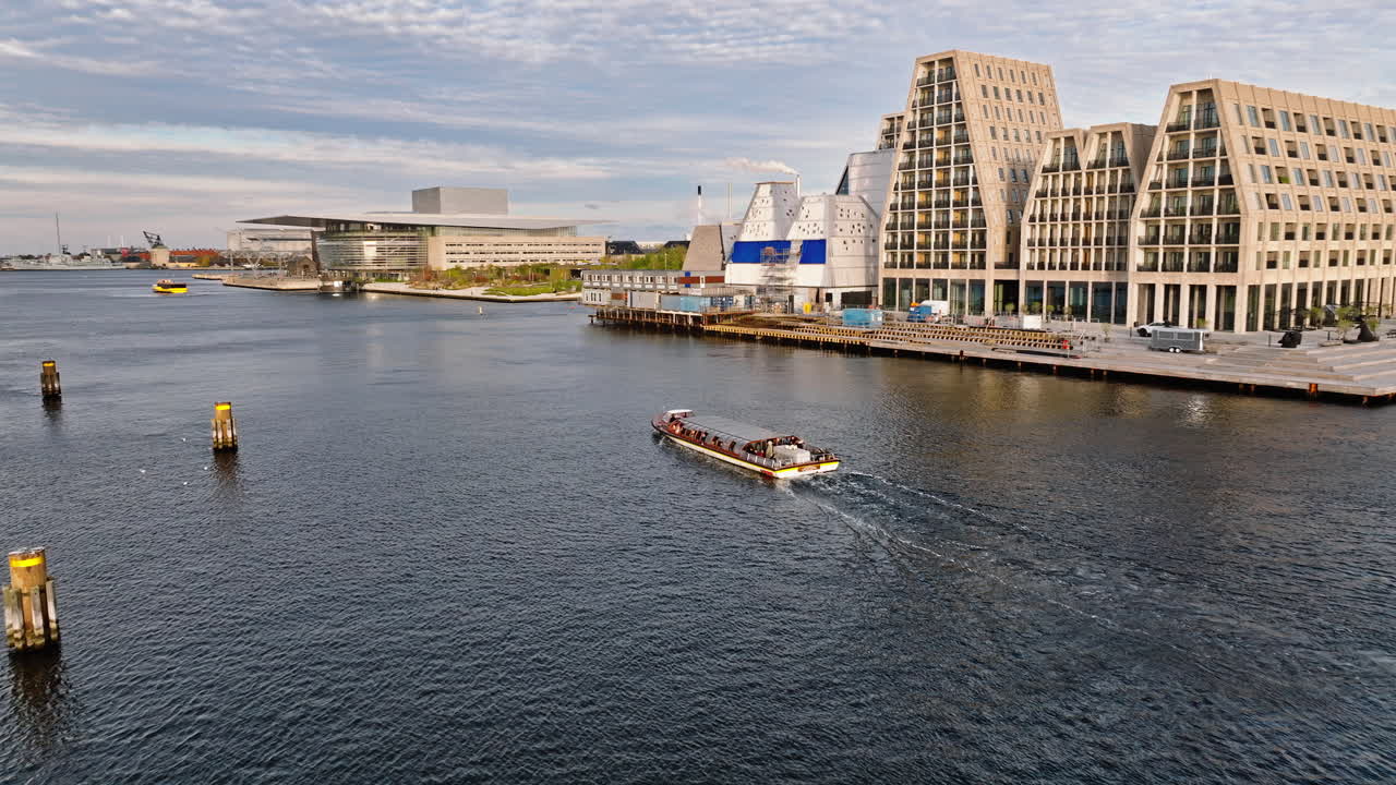 Aerial drone view of the Paper Island urban oasis surrounded by water in Copenhagen, Denmark in daylight