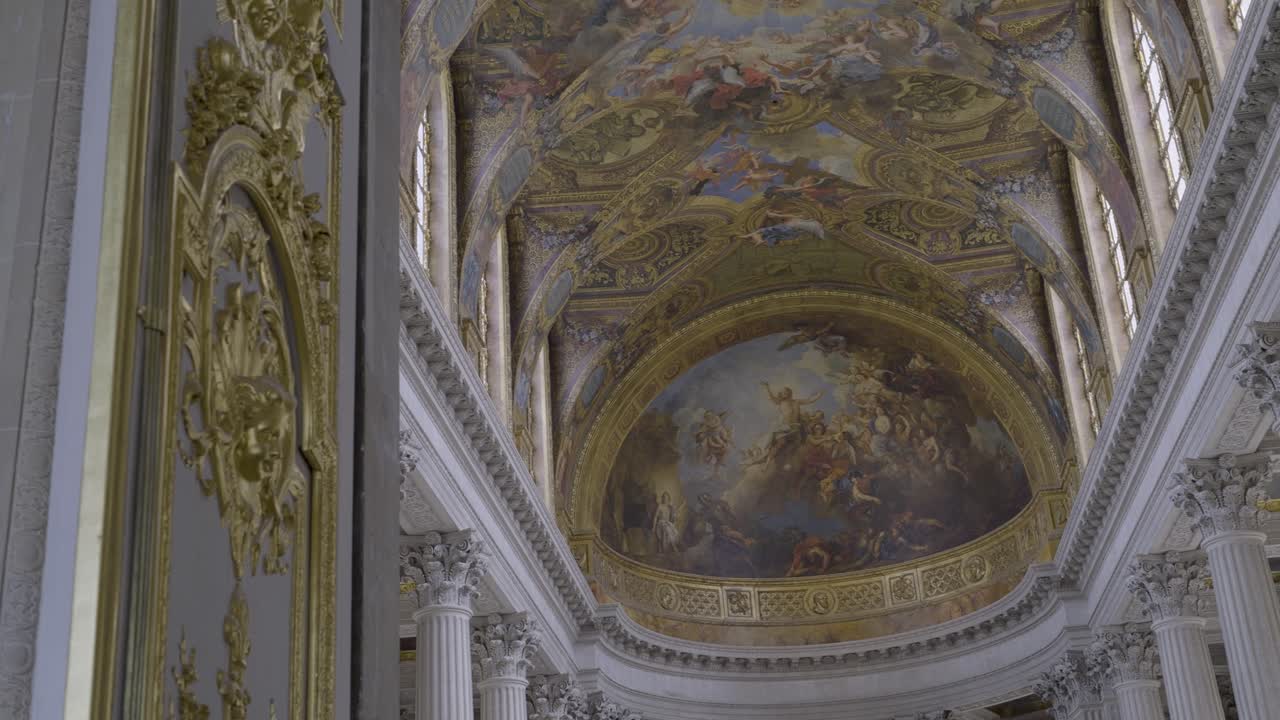 Ornate palace chapel interior, painted ceiling and columns, Versailles France heritage site