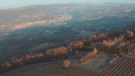 panoramic golden hour drone flight over rural verona mountains near garda and como lake and venice, italy