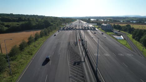 ireland epic locations traffic moving in and out of toll booth waterford city bypass late summer evening