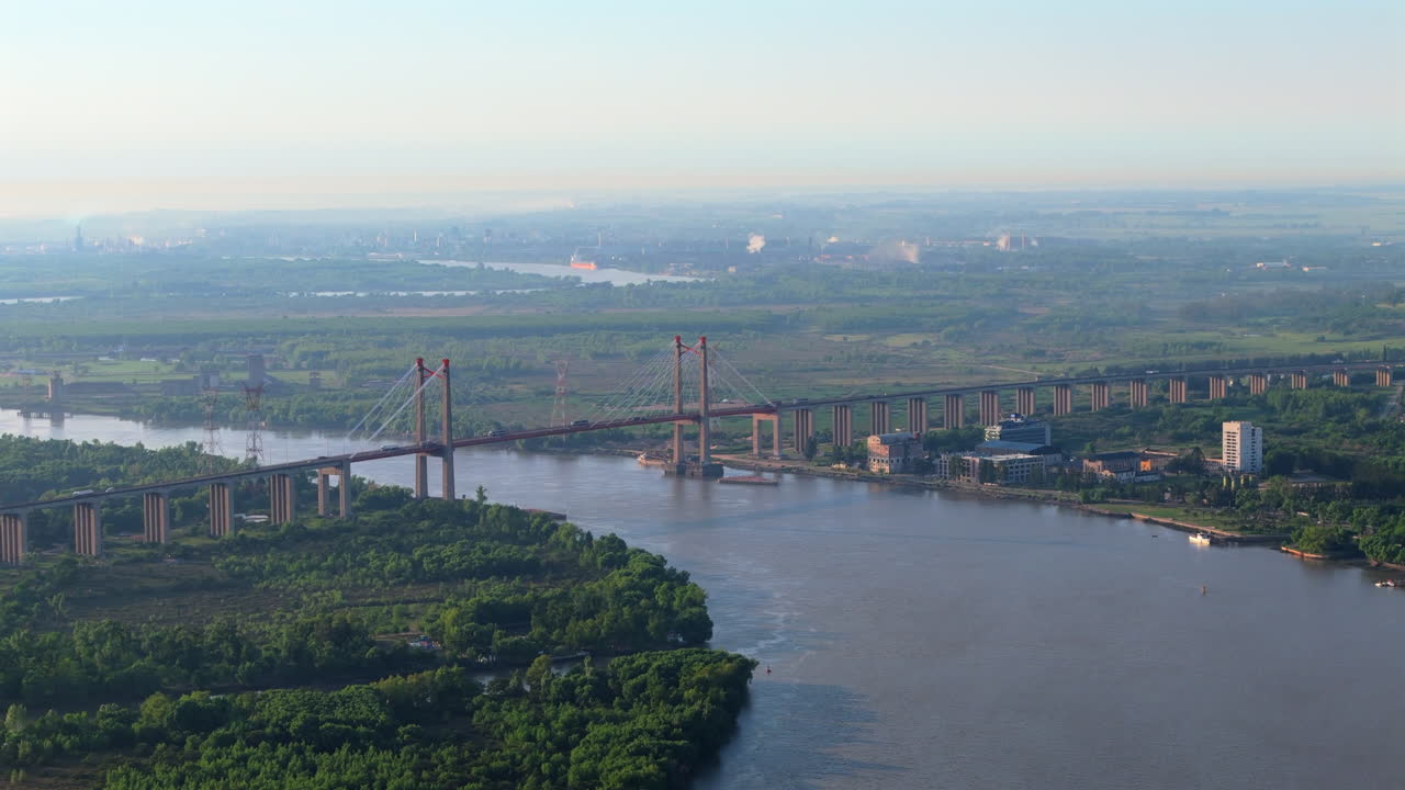 Flying over suspension bridge Zárate Brazo Largo over Paraná River, Argentina