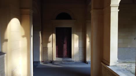 1 million $ aerial flight fly backwards drone shot of a door in a palace