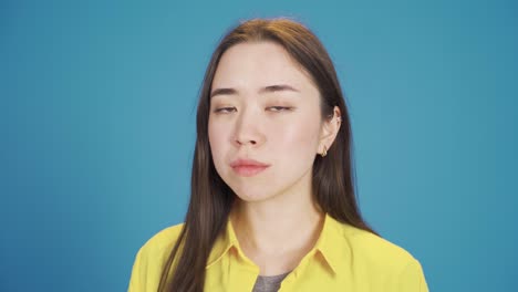 Close-up-portrait-of-young-Asian-woman.