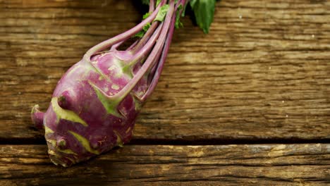 close-up of kohlrabi on wooden table 4k