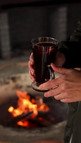 warm mulled wine by the fireplace