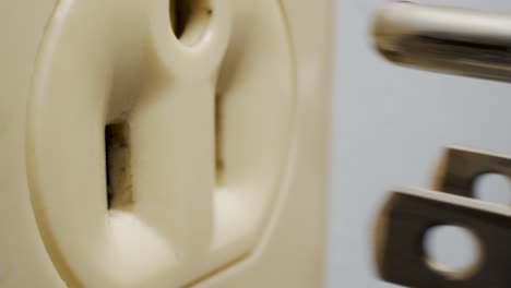 Macro-shot-of-a-plug-going-into-a-socket