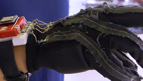 technical-glove-on-hand-of-engineer