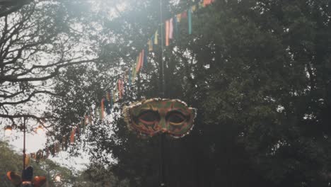 a festive display of hanging masks from india, celebrating its rich culture and traditions