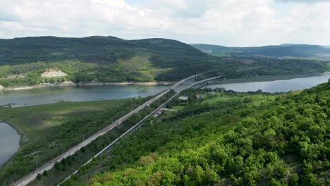 Lush-forested-mountains-surrounding-Tsonevo-reservoir-near-Asparuhovo,-aerial