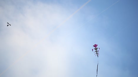 unique kite flying with blue sky background