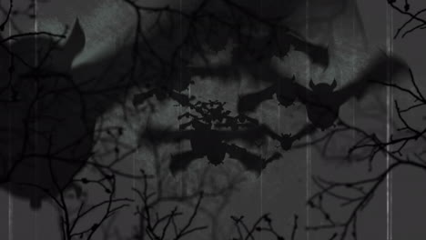 animation of interference over scary halloween bats flying and tree branches on grey background