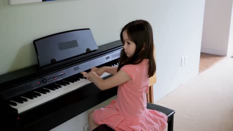 little girl playing piano 4k