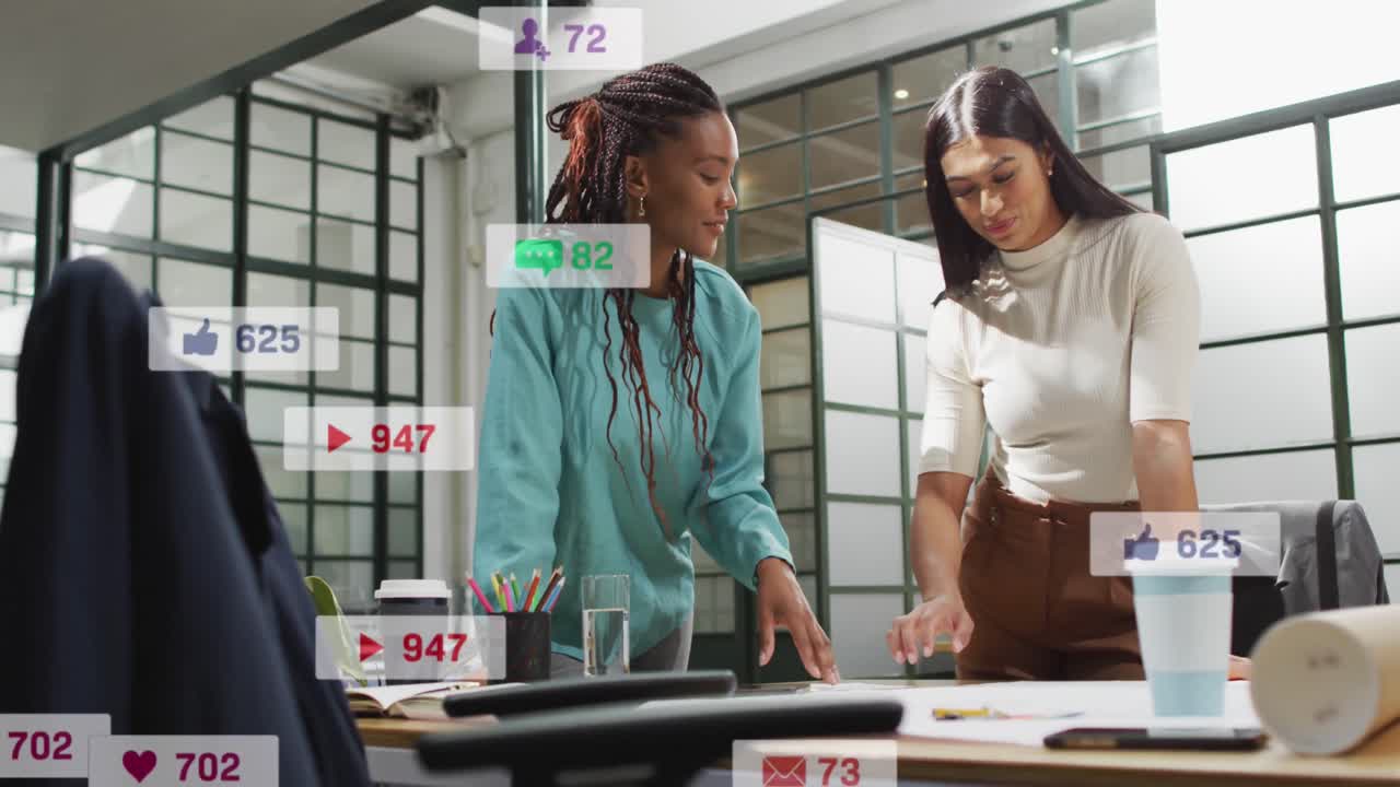 Animation of changing numbers and icons in notification bars, female coworkers sharing ideas