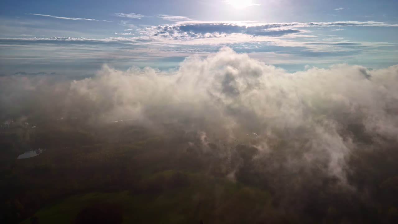 Closeup of clouds, smoke floating over agricultural fields, Aerial POV