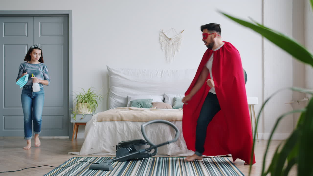 Superhero Cleaning Couple in Bedroom