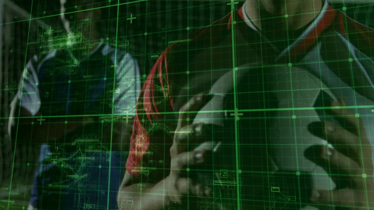 Man in red kit adjusting soccer ball, green grid overlay appearing and camera zooming for analytics