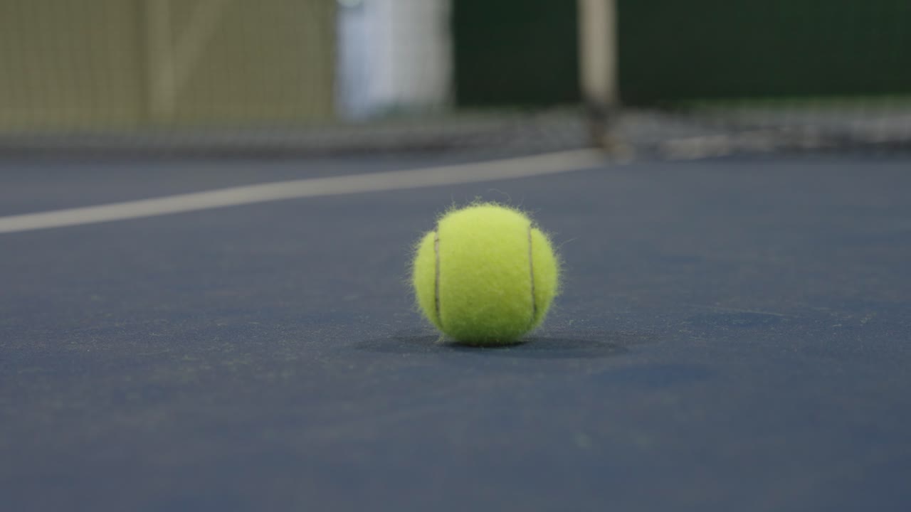 Tennis Ball On The Tennis Court
