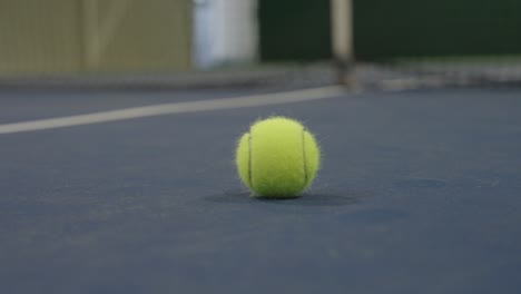 Tennis-Ball-On-The-Tennis-Court