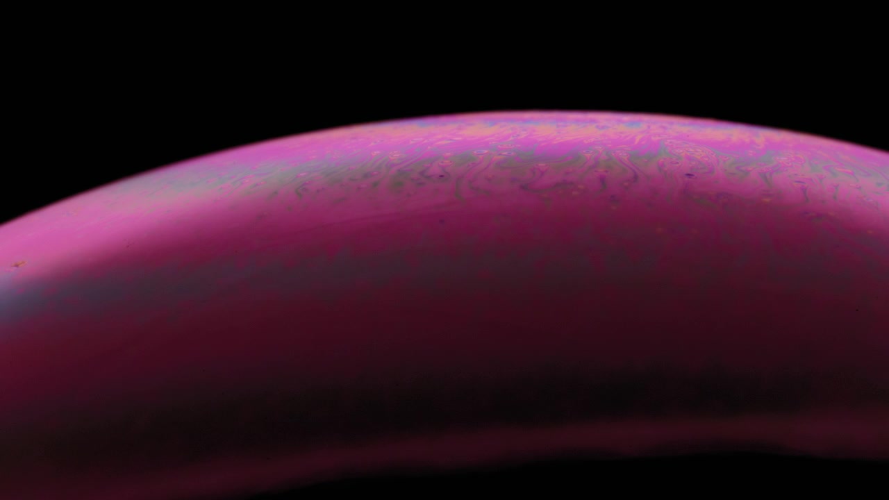 Colori rosa di una superficie di bolla di sapone