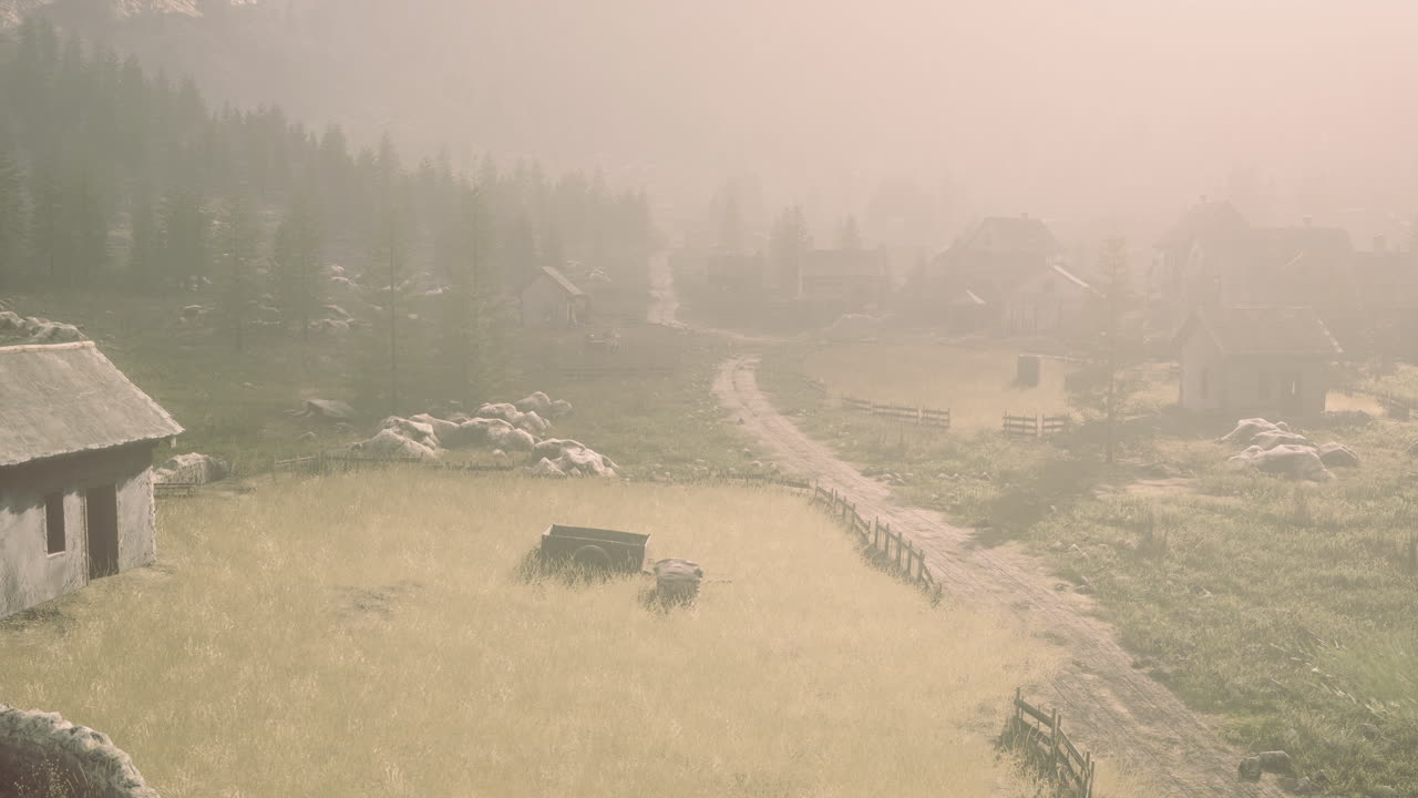Misty morning in a tranquil countryside village surrounded by mountains