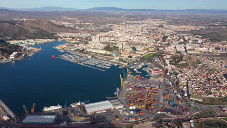 Commercial-harbour-and-the-city-of-Cartagena-Spain-sunny-day-aerial-view