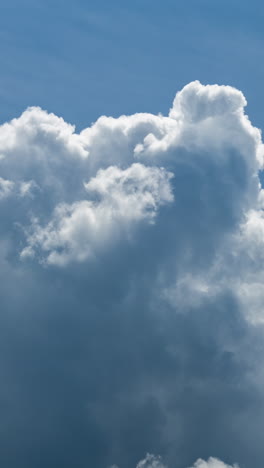 sky-with-passing-cloudsin-vertical