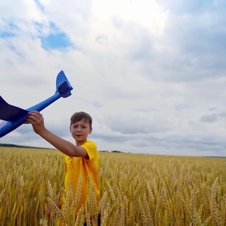 boy with airplane toy