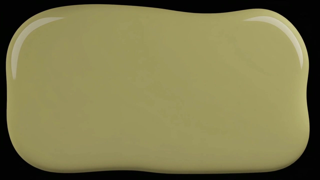 A smooth puddle of olive green paint on a black background
