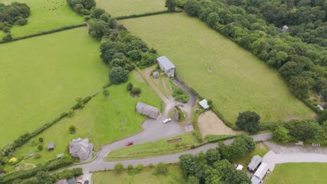 aerial view of fields and buildings in a rural landscape
