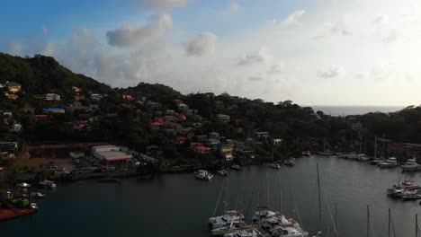 a caribbean village in the mountains overlooking the harbour