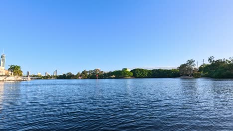 boat travels through scenic gold coast canals