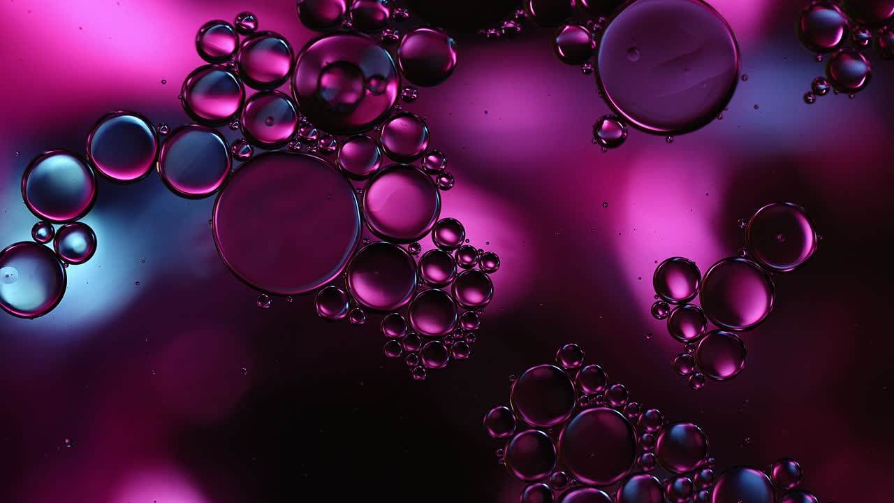 Abstract Colorful Food Oil Drops Bubbles and spheres Flowing