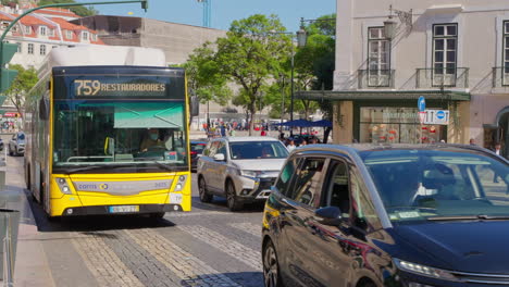 lisbon city street scene with bus and cars