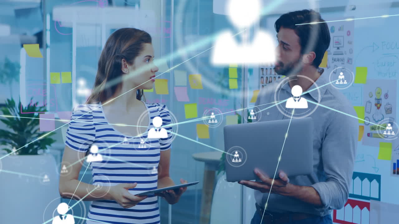 In office, business professionals discussing with digital network animation overlay