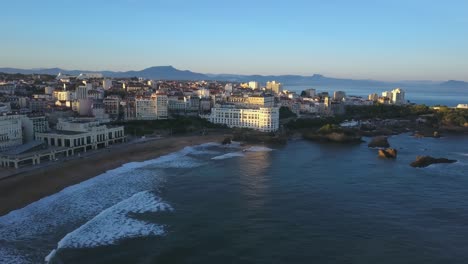historical buildings along grande plage beach at biarritz