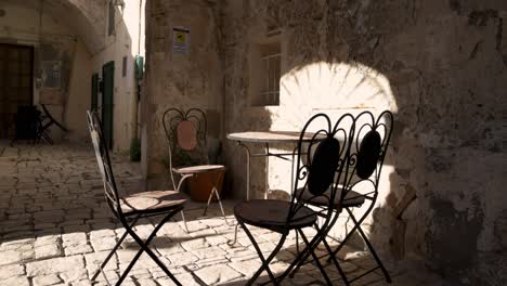 matera, italy chairs and sun beam