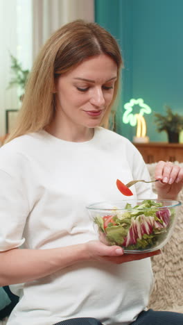 pregnant woman smiles eating cabbage tomato salad promotes simple healthy diet for baby health daily