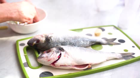 preparation of the stuffing for the sea bream