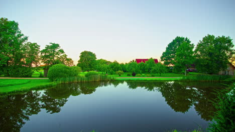 beautiful-cottage-near-a-pond-or-lake-timelapse