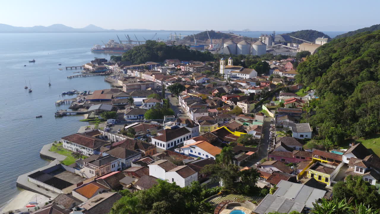 Panoramic drone fly over the Baia da Babitonga bay residential areas, Sao Francisco do Sul, Santa Catarina, Brazil