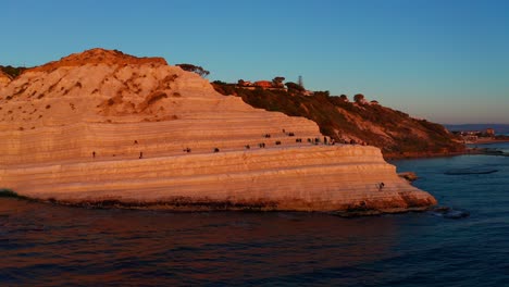 Luftaufnahme-Der-Scala-Dei-Turchi-Im-Orangefarbenen-Abendlicht